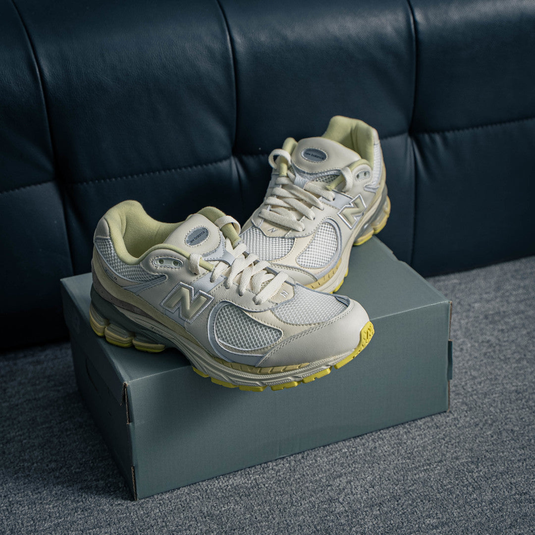 AURALEE x New Balance 2002R "White / Sand Beige"
