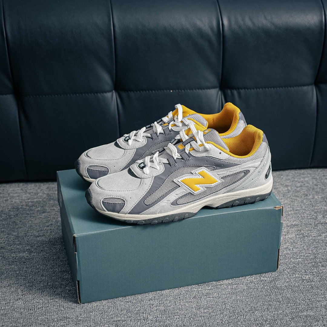 New Balance 204L "Raincloud / Baroque Gold"