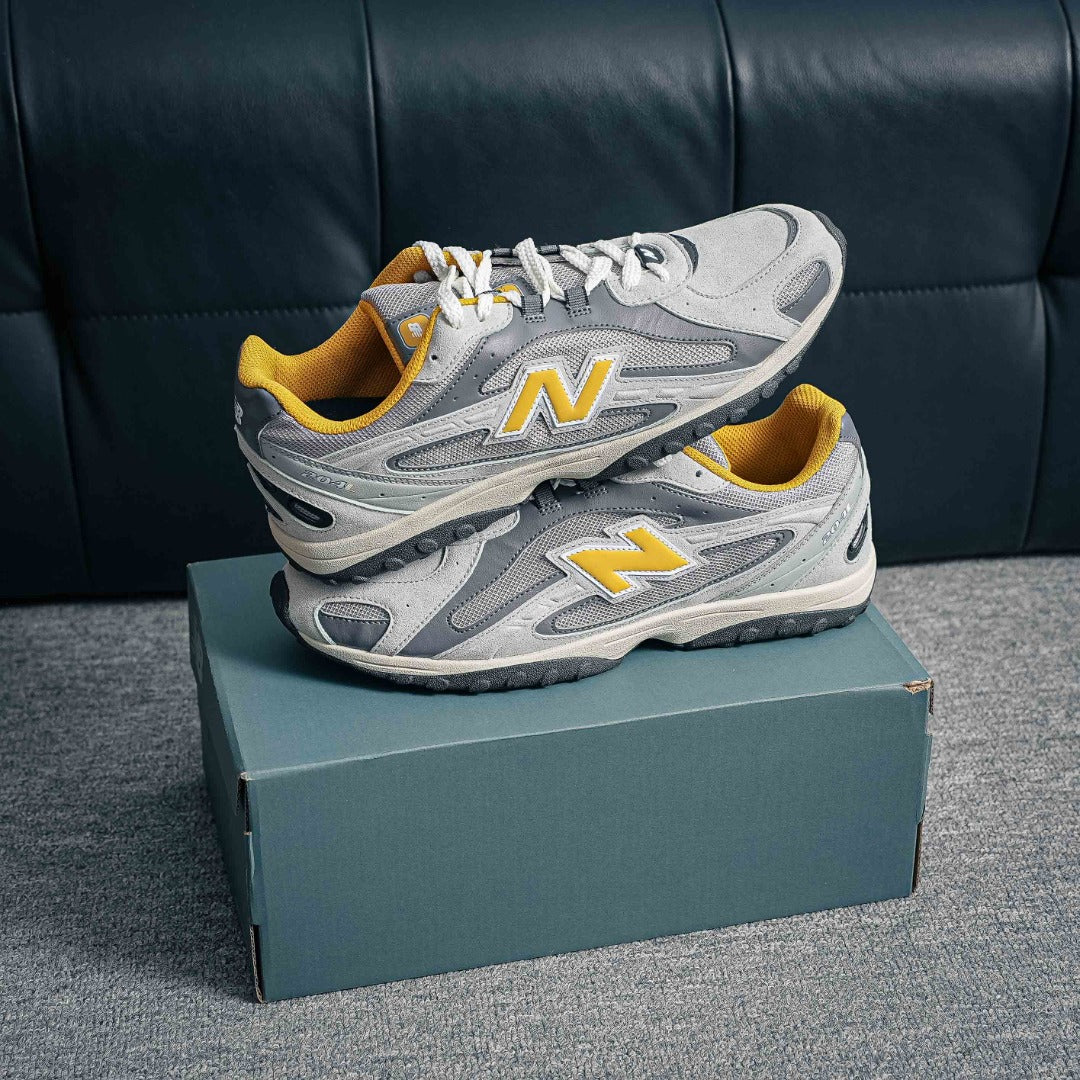 New Balance 204L "Raincloud / Baroque Gold"