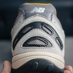 New Balance 204L "Raincloud / Baroque Gold"