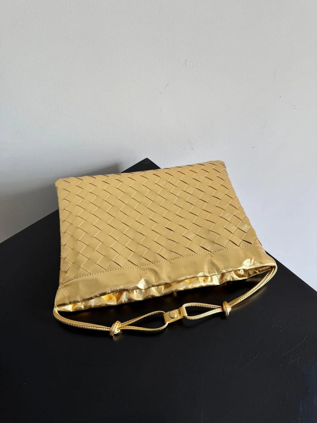 Bottega Veneta 2026 Dust Bag Gold Laminated Leather