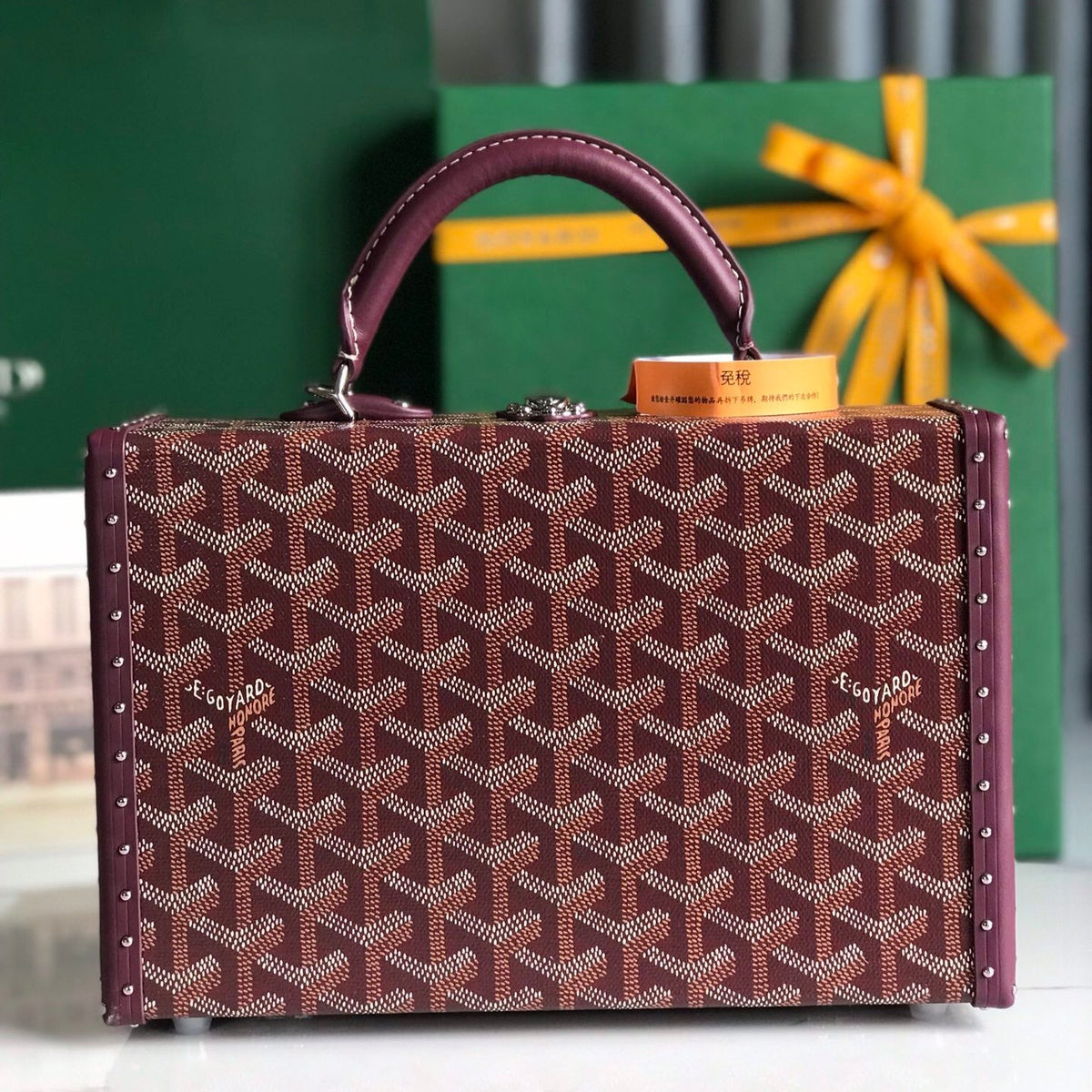 GRAND HÔTEL TRUNK BAG 24 IN BURGUNDY RED GOYARDINE CANVAS AND CALFSKIN