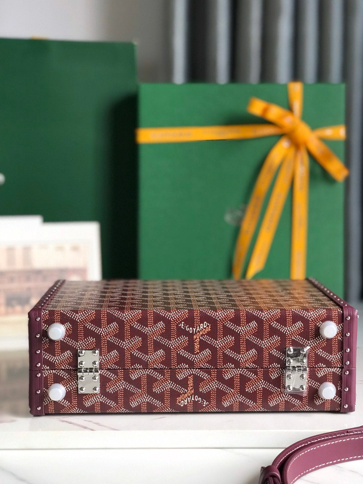 GRAND HÔTEL TRUNK BAG 24 IN BURGUNDY RED GOYARDINE CANVAS AND CALFSKIN