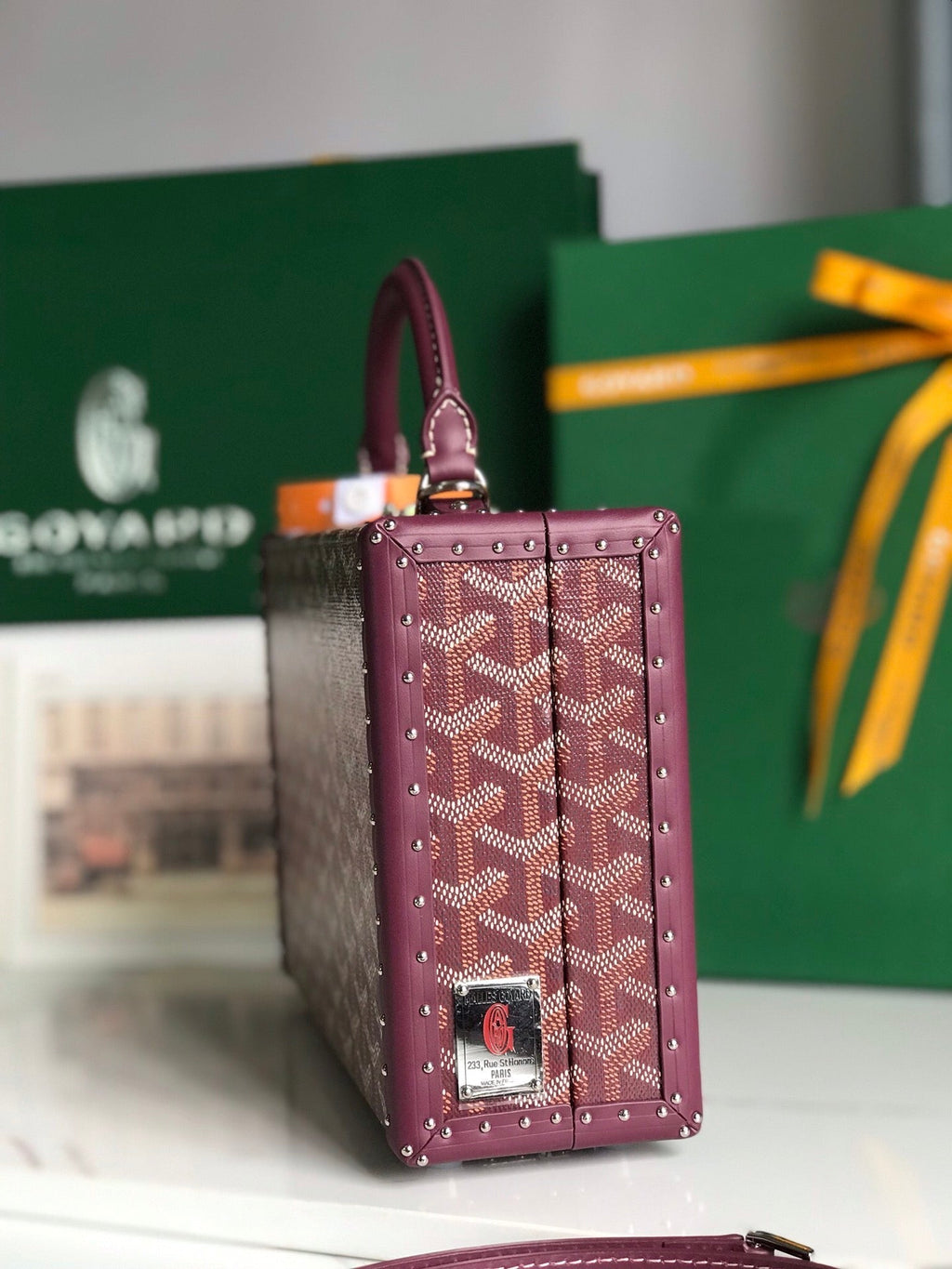 GRAND HÔTEL TRUNK BAG 24 IN BURGUNDY RED GOYARDINE CANVAS AND CALFSKIN