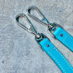 SMALL BELHARRA 24 IN BABY BLUE GOYARDINE CANVAS AND LAMBSKIN