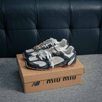New Balance x Miu Miu 530 SL "Deco Calf Leather Black / White"