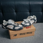 New Balance x Miu Miu 530 SL "Deco Calf Leather Black / White"