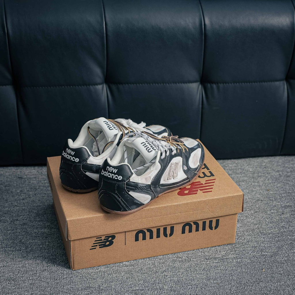 New Balance x Miu Miu 530 SL "Deco Calf Leather Black / White"