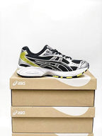 ASICS Unisex GEL-Kayano 14 "Black / Lemon Spark"