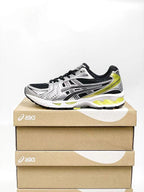 ASICS Unisex GEL-Kayano 14 "Black / Lemon Spark"