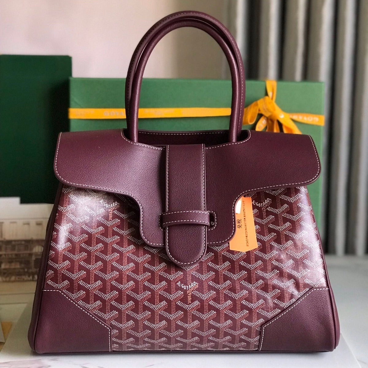 SAIGON SOUPLE BAG 34 IN BURGUNDY RED GOYARDINE CANVAS AND CALFSKIN