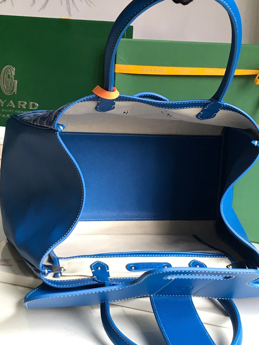 SAIGON SOUPLE BAG 34 IN CURIOUS BLUE GOYARDINE CANVAS AND CALFSKIN