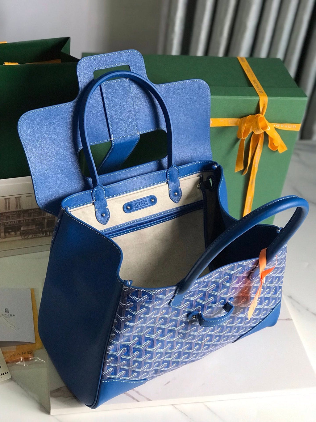 SAIGON SOUPLE BAG 34 IN CURIOUS BLUE GOYARDINE CANVAS AND CALFSKIN