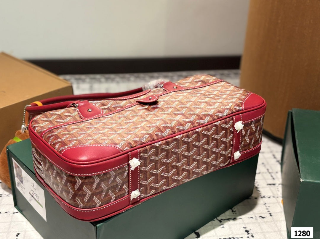 SAINT MARTIN BAG 35 IN BURGUNDY RED GOYARDINE CANVAS AND CALFSKIN