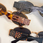 FIRST CRYSTAL OVAL FRAME SUNGLASSES 7028 IN METAL