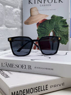 TRIOMPHE SUNGLASS 497820 IN GOLD METAL BLACK LENSES
