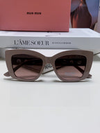 LOGO CAT EYE SUNGLASSES 513003 IN NUDE ACETATE