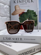 TRIOMPHE SUNGLASSES 552774 IN BABY PINK ACETATE TEXT LOGO