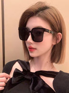 MONTAIGNE SUNGLASS 560862 IN BLACK ACETATE
