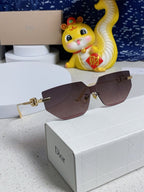 MONTAIGNE SUNGLASS 563192 IN GOLD METAL BROWN SMOKE LENSES
