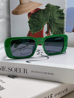 MONTAIGNE SUNGLASS 571594 IN GREEN ACETATE TEXT LOGO