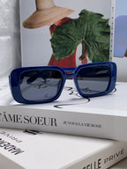 MONTAIGNE SUNGLASS 571595 IN BLUE ACETATE TEXT LOGO