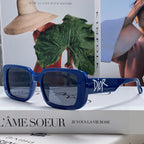 MONTAIGNE SUNGLASS 571595 IN BLUE ACETATE TEXT LOGO