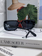 MONTAIGNE SUNGLASS 571596 IN BLACK ACETATE TEXT LOGO