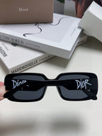 MONTAIGNE SUNGLASS 571596 IN BLACK ACETATE TEXT LOGO