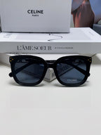 TRIOMPHE SUNGLASSES  573252 IN BLACK ACETATE METAL LOGO